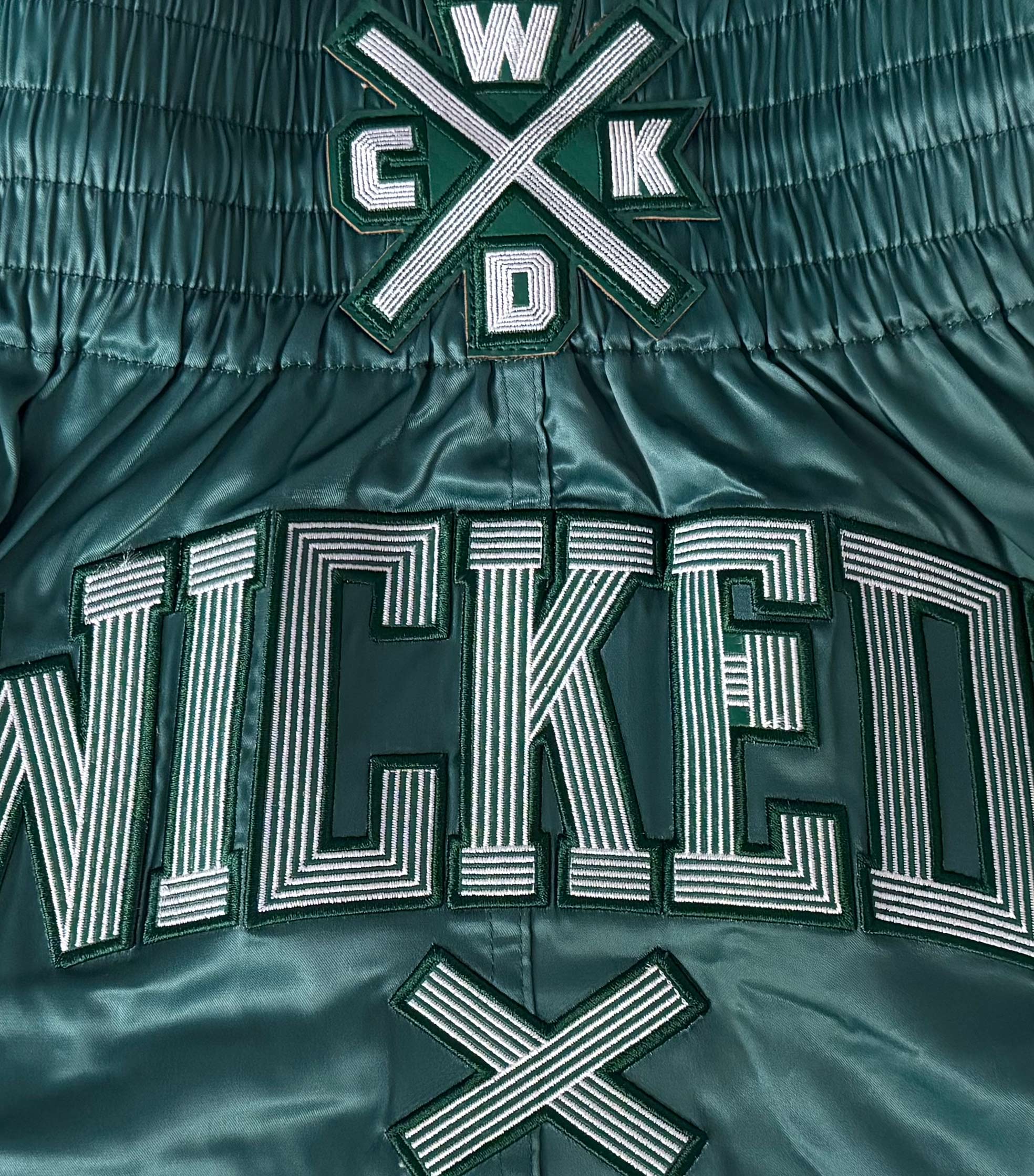 MUAY THAI SHORT CROSS-LINE VERT