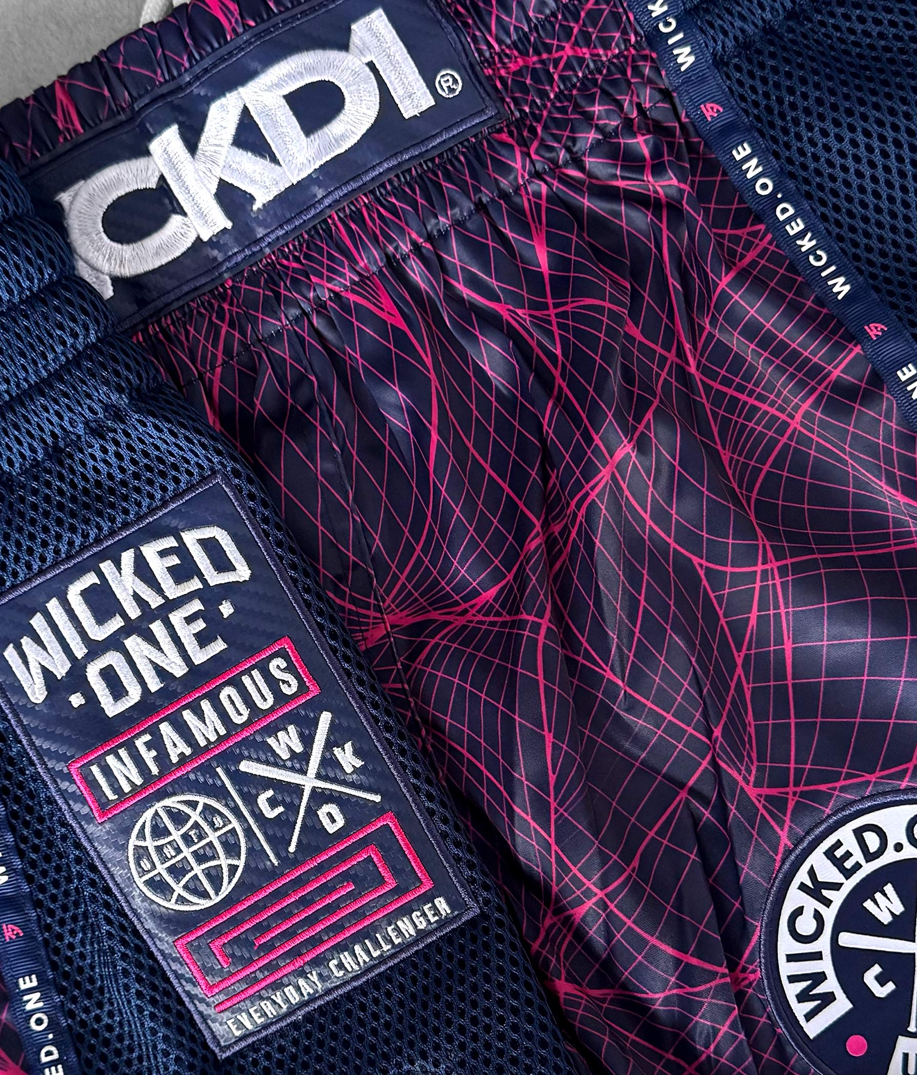 MUAY THAI SHORT METAVERS NAVY/ROSE